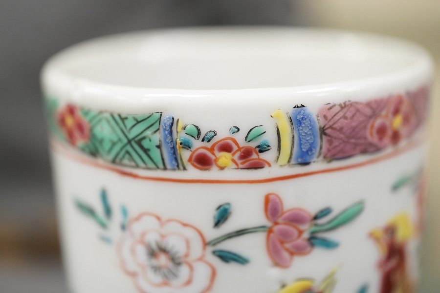 A near pair of Chinese famille rose ‘double pheasant’ coffee cups, early Qianlong period